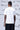 White graphic t-shirt men UAE with line art print, premium cotton fabric
