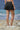 Black skirt for women with clean waistband and minimal detailing