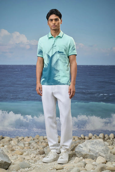 Mint green dotted abstract print polo t-shirt for men by Genes Lecoanet Hemant India