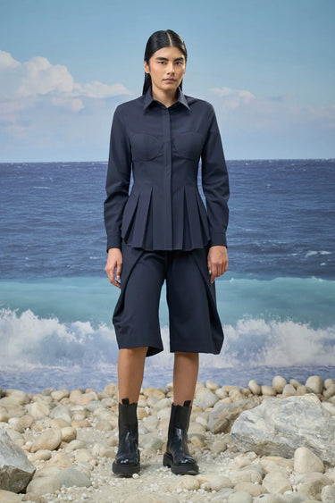 Navy relaxed shirt for women with oversized fit and fluid silhouette