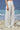 White trousers for women with relaxed fit and fluid silhouette