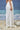 White viscose nylon trousers for women showing breathable smooth fabric texture