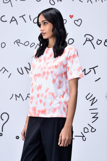 Heart print cotton t-shirt women in coral peach color, premium fashion UAE