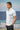 Blue polo t-shirt for men with collar neckline and print detailing