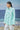 Mint green cotton poplin shirt for women showing breathable crisp fabric texture