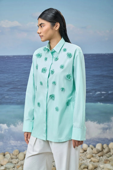 Mint green cotton poplin shirt for women showing breathable crisp fabric texture