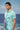 Stylish mint green polo t-shirt for men with dotted print, modern designer wear