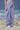 Navy cotton trousers for women showing breathable textured fabric