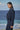 Navy poly viscose relaxed jacket for women showing smooth breathable fabric texture