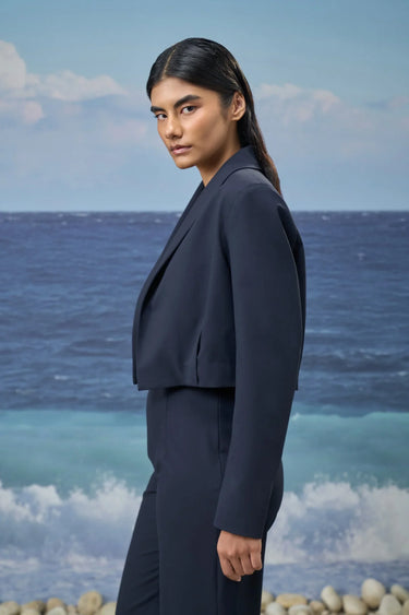 Navy poly viscose relaxed jacket for women showing smooth breathable fabric texture