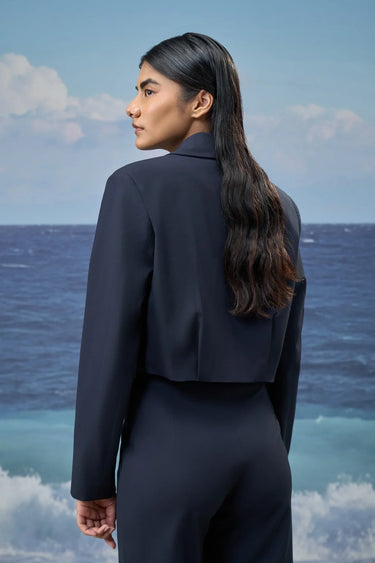 Navy relaxed jacket for women with clean back design and structured tailoring