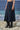 Navy pleated skirt for women with elastic waistband and clean detailing
