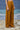 Caramel viscose nylon trousers for women showing smooth breathable fabric texture