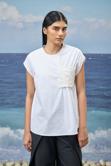 White sleeveless top for women with relaxed fit and clean silhouette